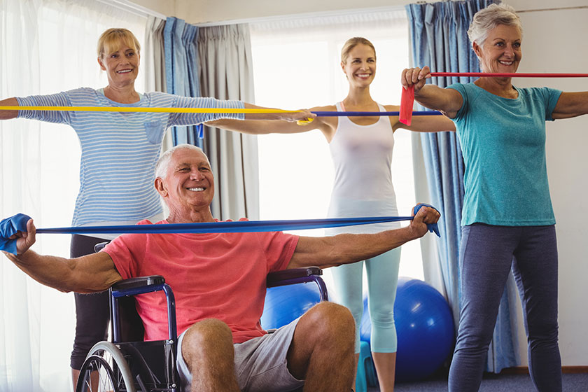 Seniors turn exercise into fun with drum sticks and stability balls